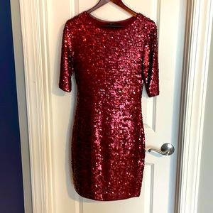 Stunning deep red BCBGMaxazria dress .